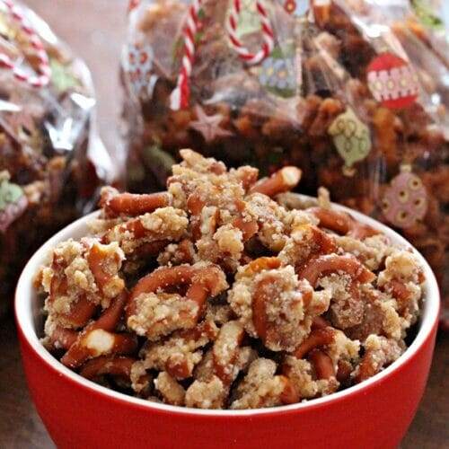 Red and white bowl filled with Malted Pretzel Crunch.