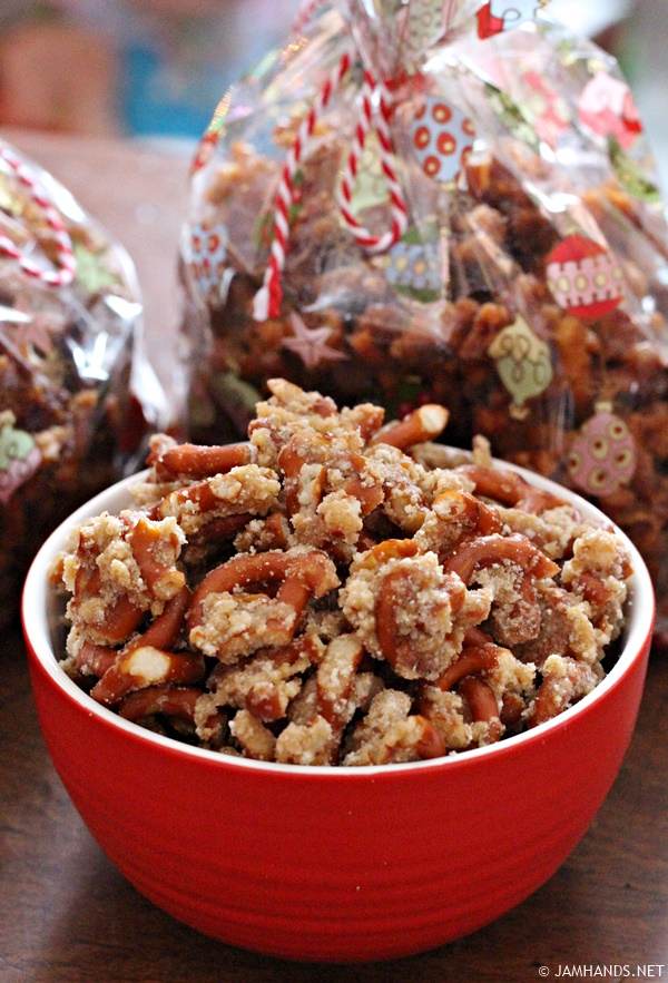 Red and white bowl filled with Malted Pretzel Crunch.