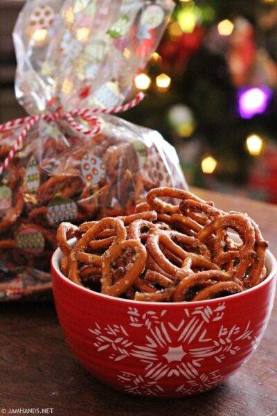 Red bowl filled with Ranch Pretzels.