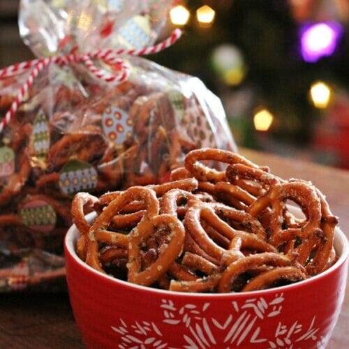 Red bowl filled with Ranch Pretzels.