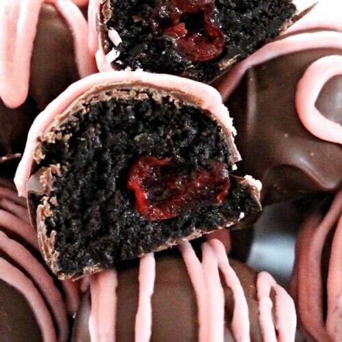 Close up of a cross section of Cherry Oreo Truffles.