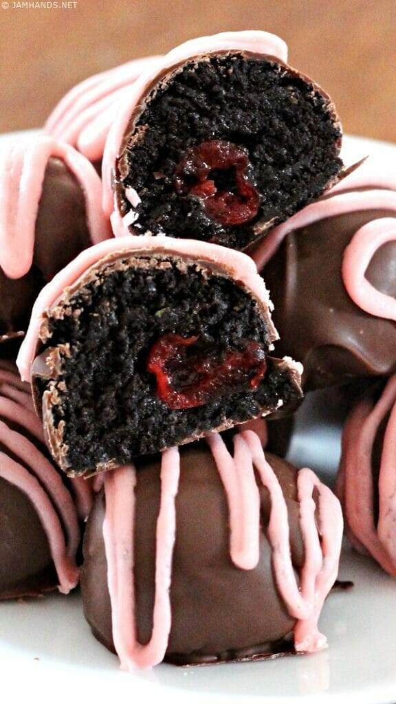Close up of a cross section of Cherry Oreo Truffles.