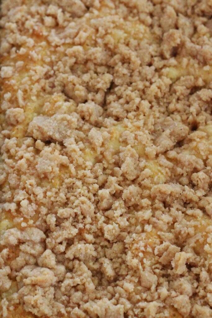 Closeup of the streusel topping of a pineapple coffeecake.